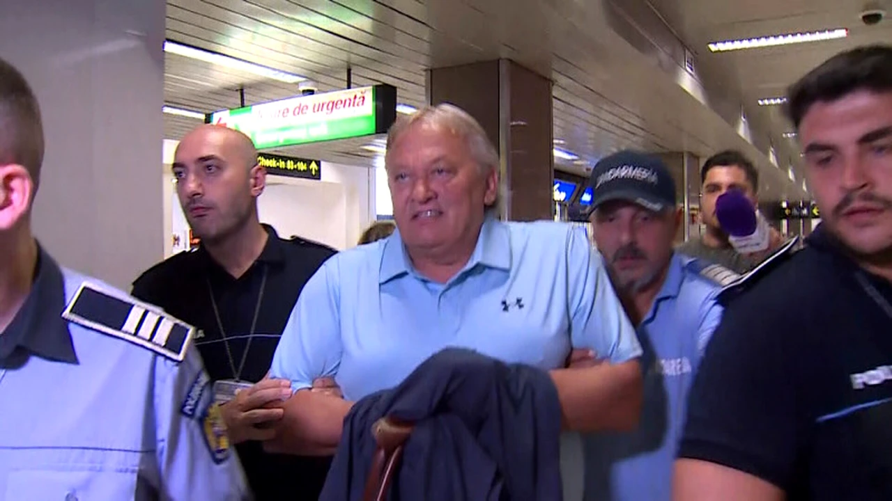 Dănuț Lupu a revenit în România și a fost arestat pe ”Otopeni”. Cum s-a comportat și primele imagini cu fostul fotbalist după ce a fost încătușat. Foto