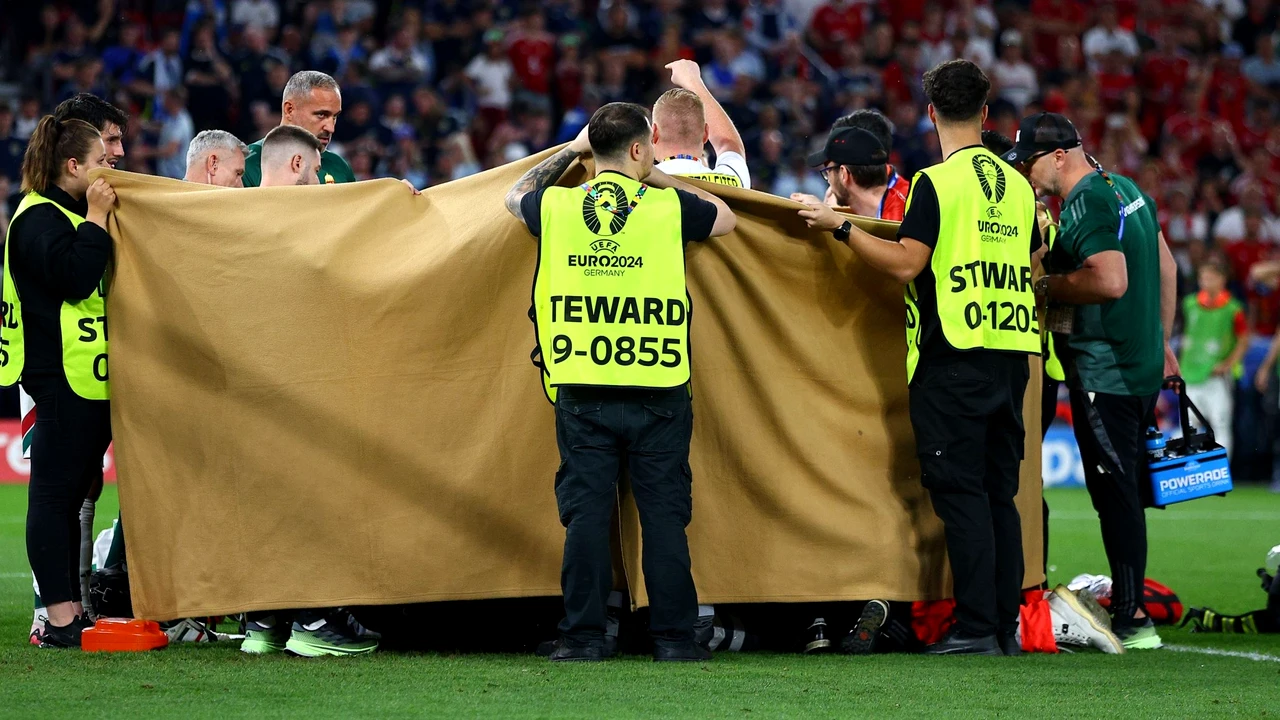 Scene șocante la EURO 2024! Atacantul Ungariei suferă o accidentare groaznică în meciul contra Scoției