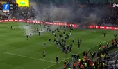 Scandal de proporții în Ligue 1. Sute de suporteri au pătruns pe gazon și au aruncat cu fumigene