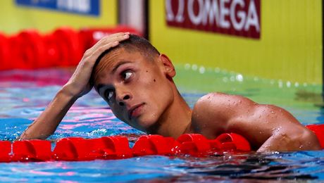 Căpușarea lui David Popovici